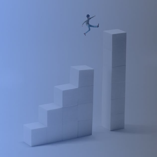 A bar graph with a person jumping over a gap in it