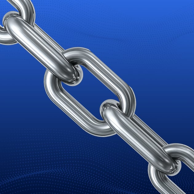 A linked silver chain on a blue background